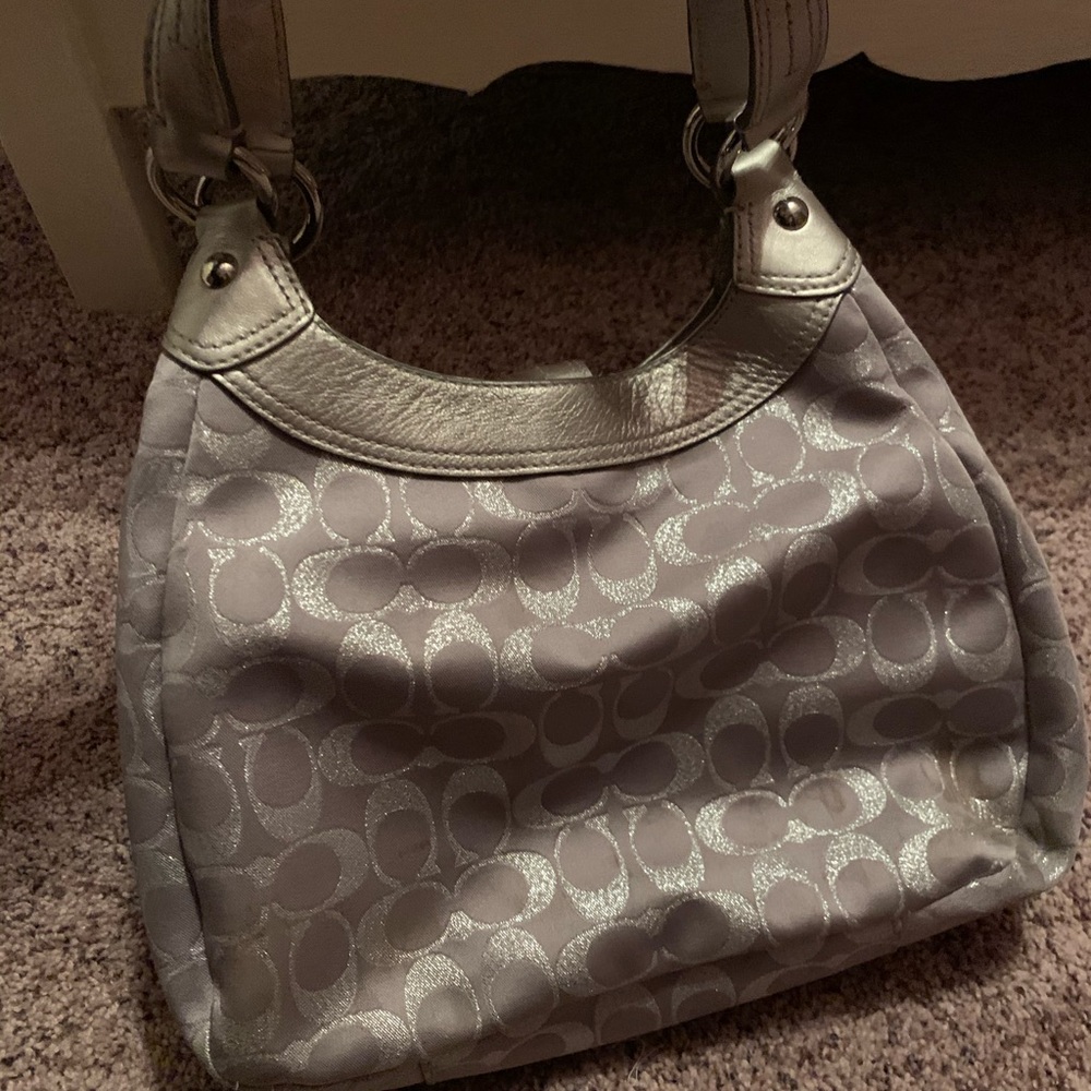 Authentic coach purse.  Few small stains pictured